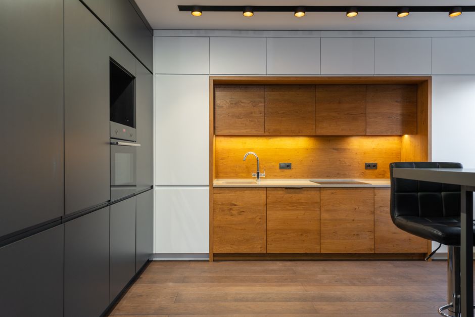 Various kitchen cabinet wood samples arranged for selection